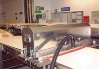 Conveyor Belt Cleaning and sanitising, removal of drips and cheese residue using the Jetvac Major